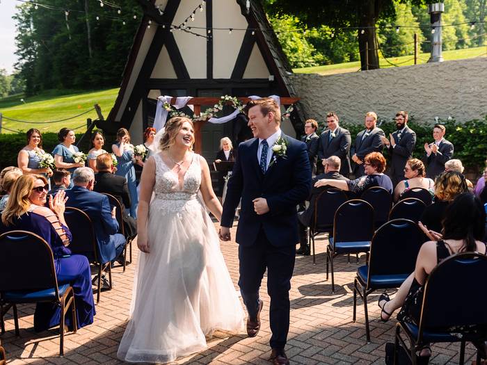 Stein Eriksen's patio couple walking down the aisle