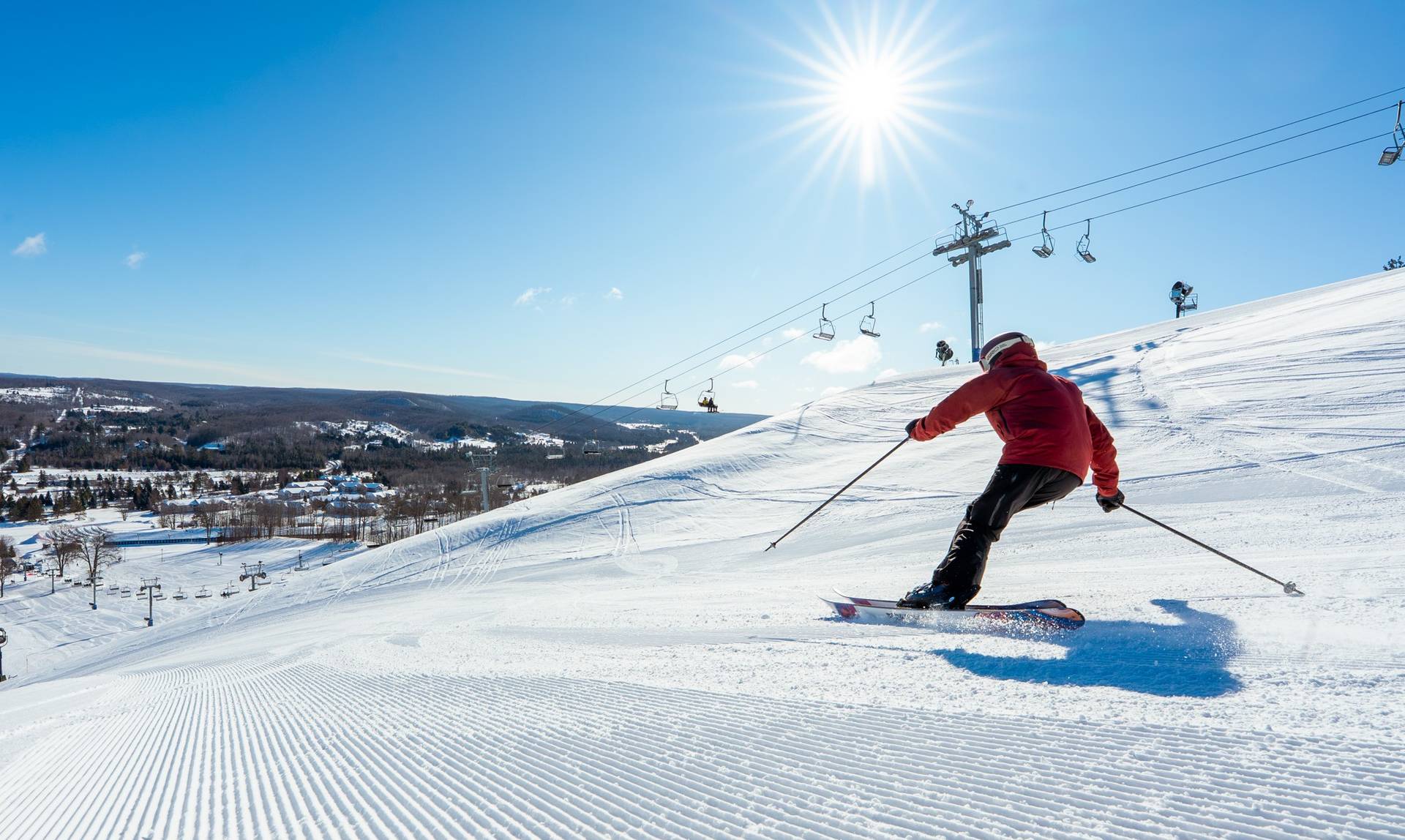 skier on Aurora at boyne mountain
