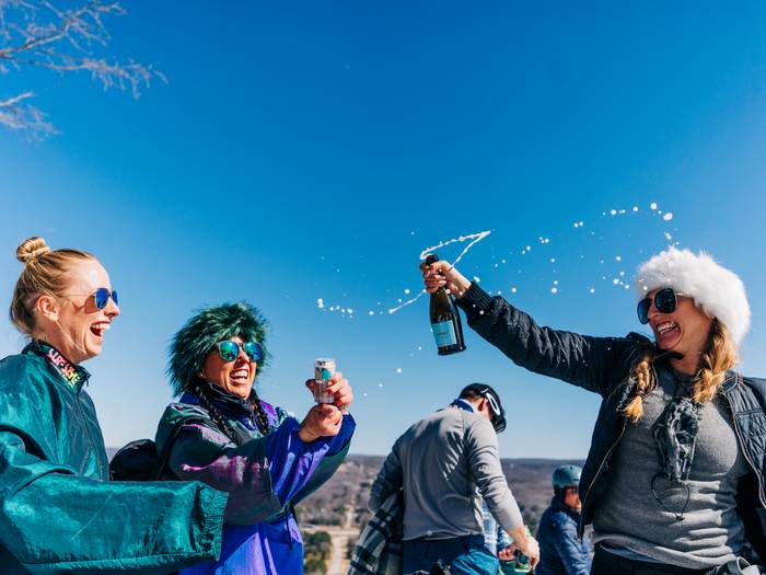 Girls drinking bubbles at the halfway house