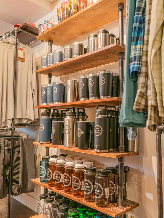 Wall of Yeti bottles at Boyne Outfitters