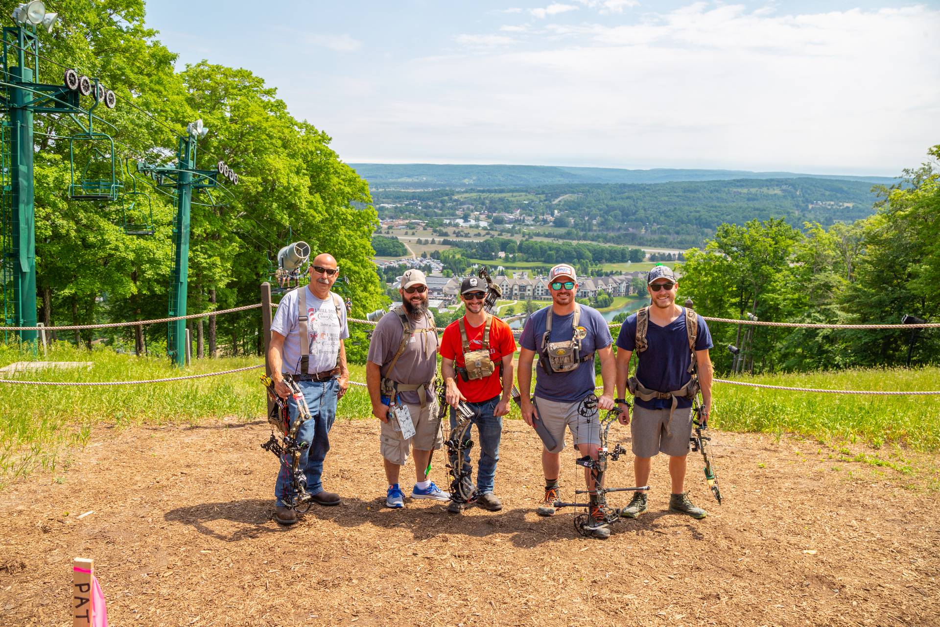group photo of participants at the summit of boyne mountain