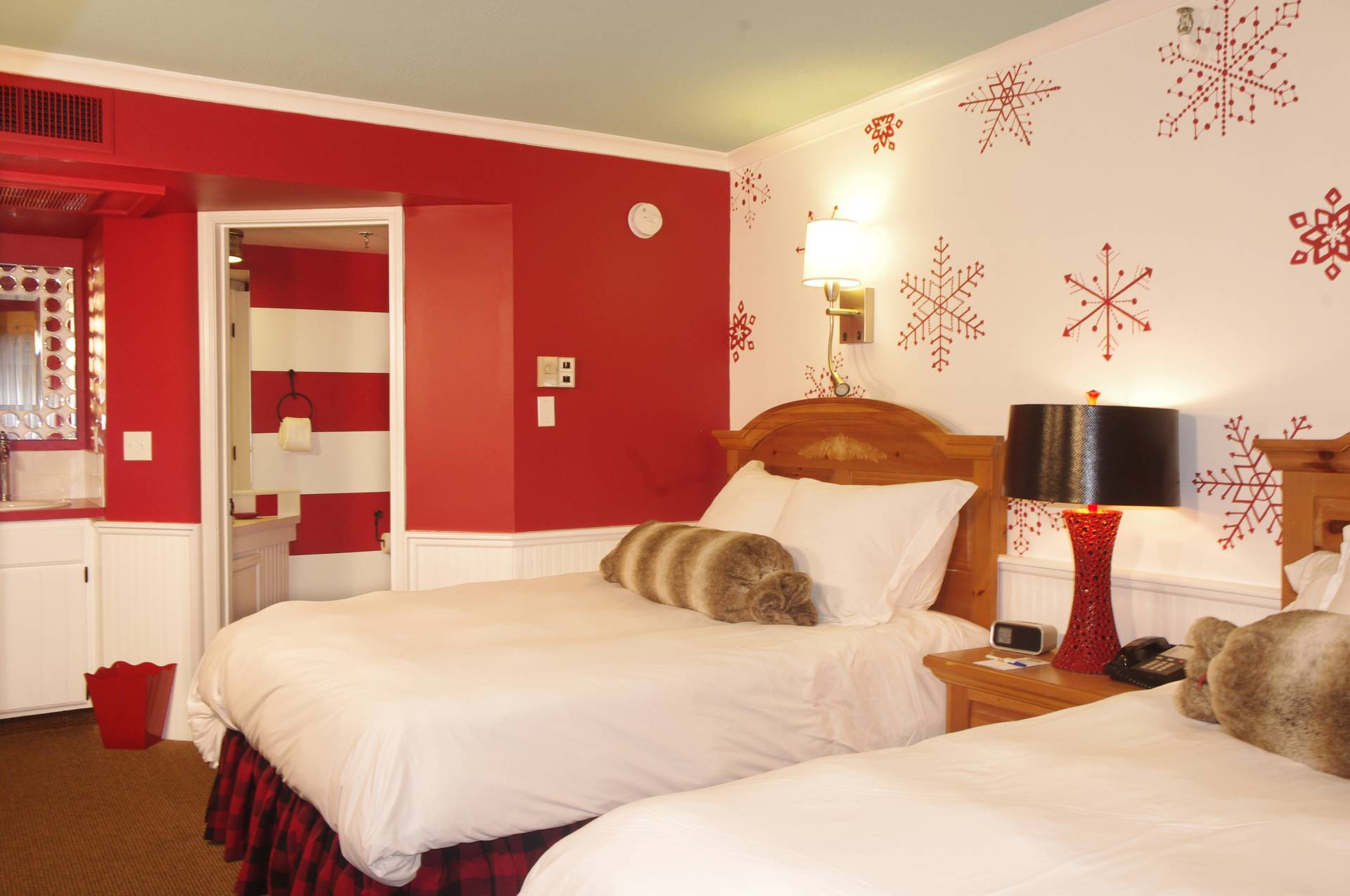 Interior of double queen in Clock Tower Lodge