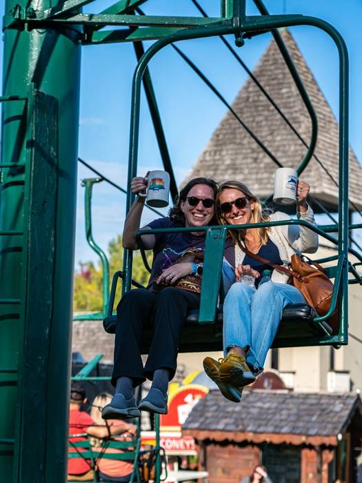 Guests riding lift