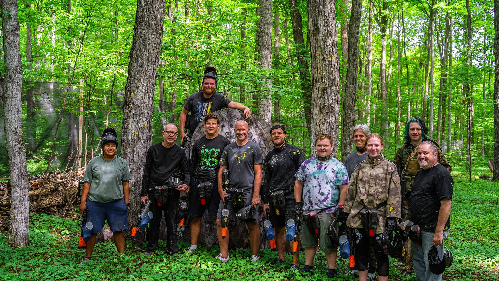 Group posing after paintball