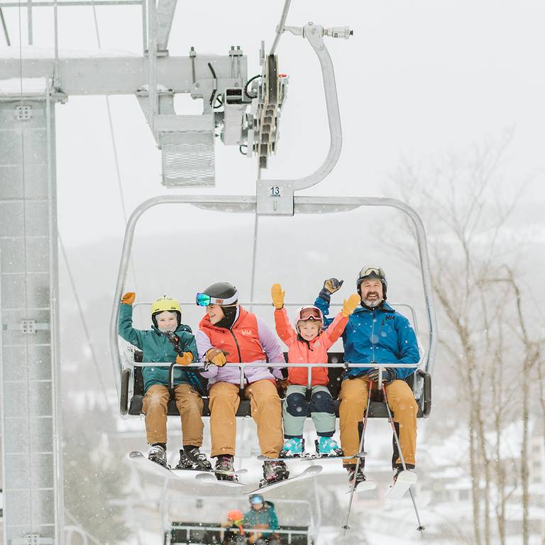 family riding boyneland chairlift
