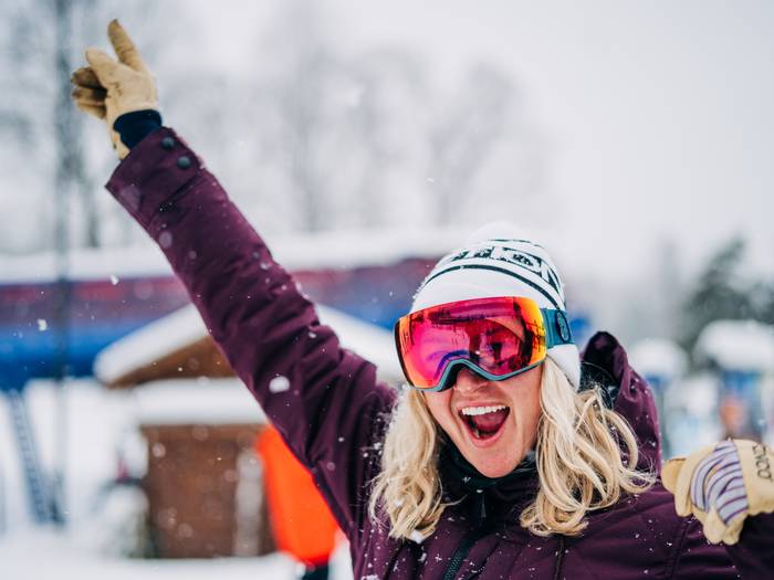 Girl on the slopes cheering