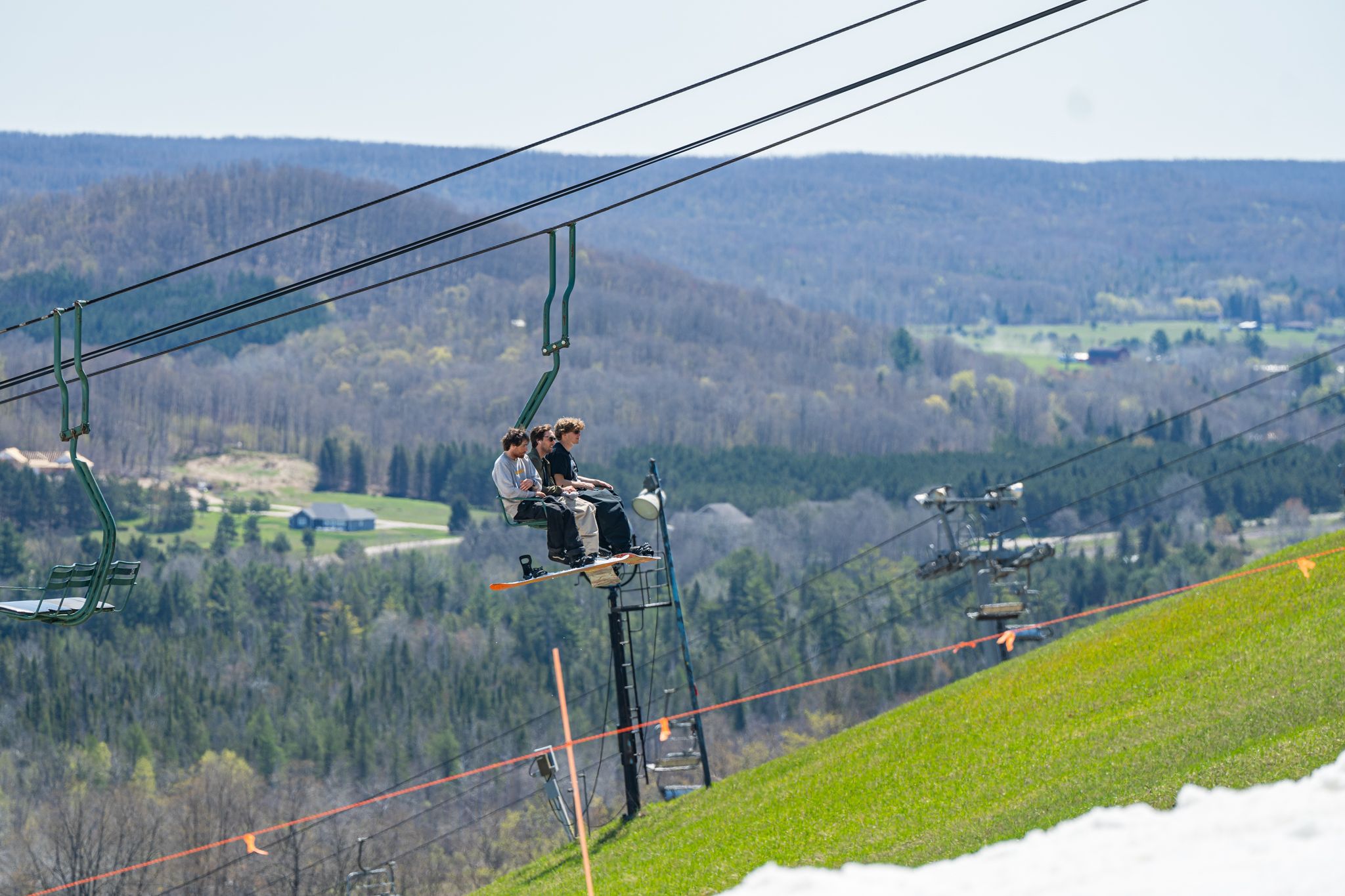 riders on chairlift