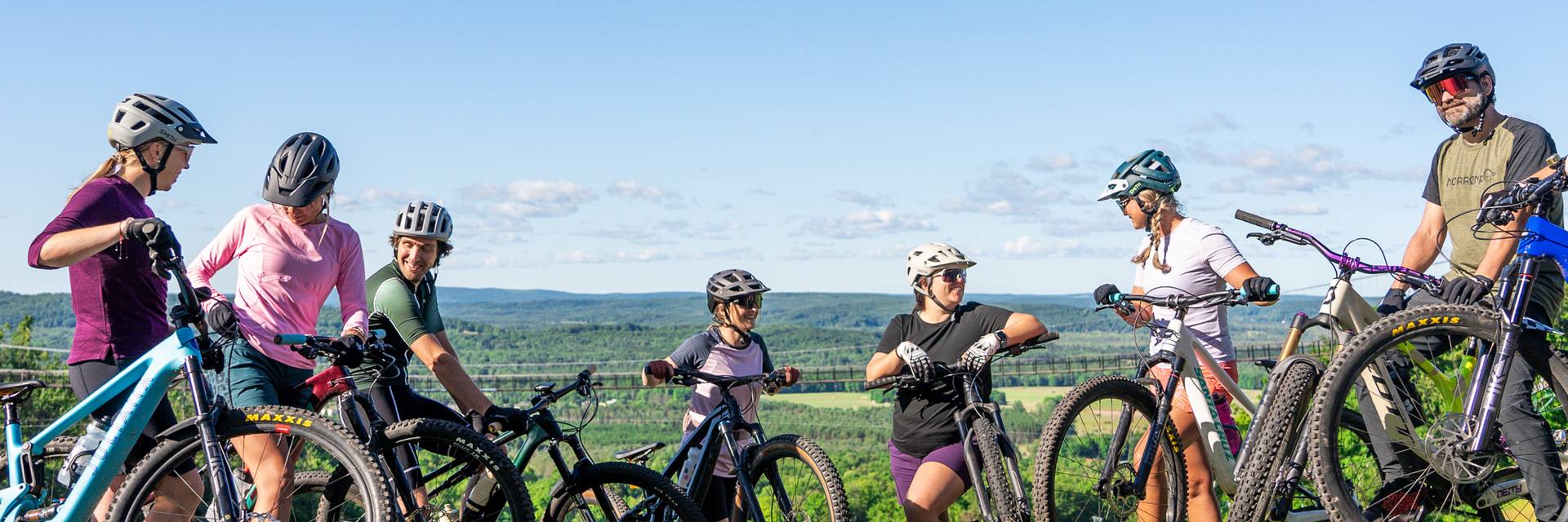 friends riding bikes at boyne mountain