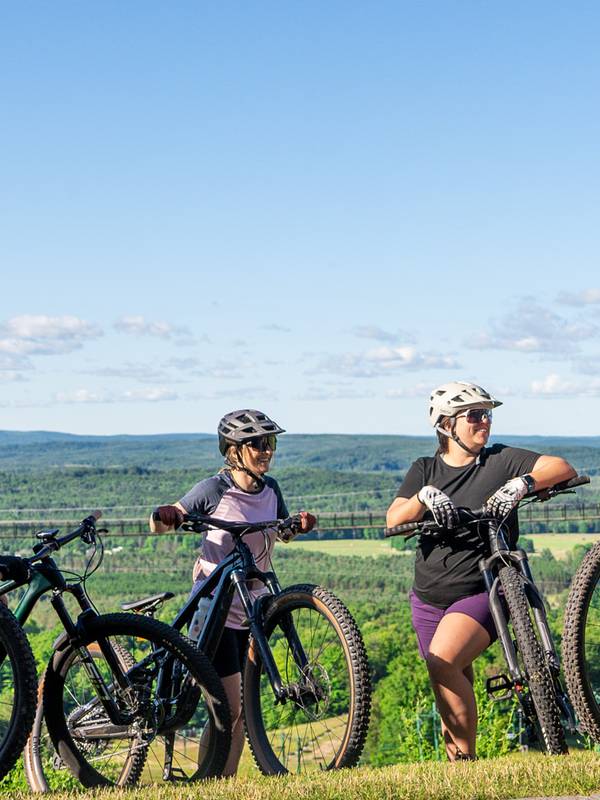 friends riding bikes at boyne mountain