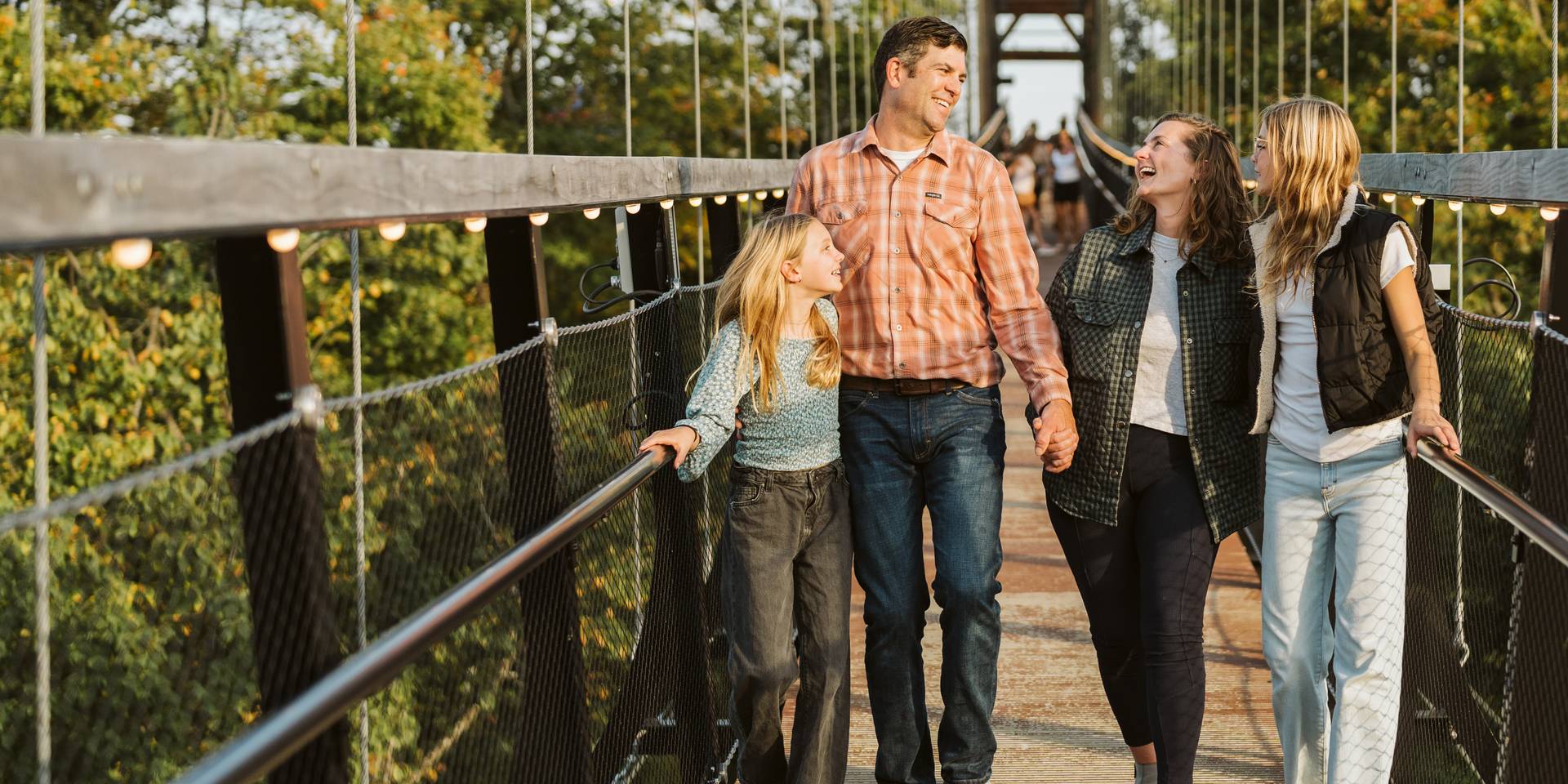 parents and baby on SkyBridge Michigan