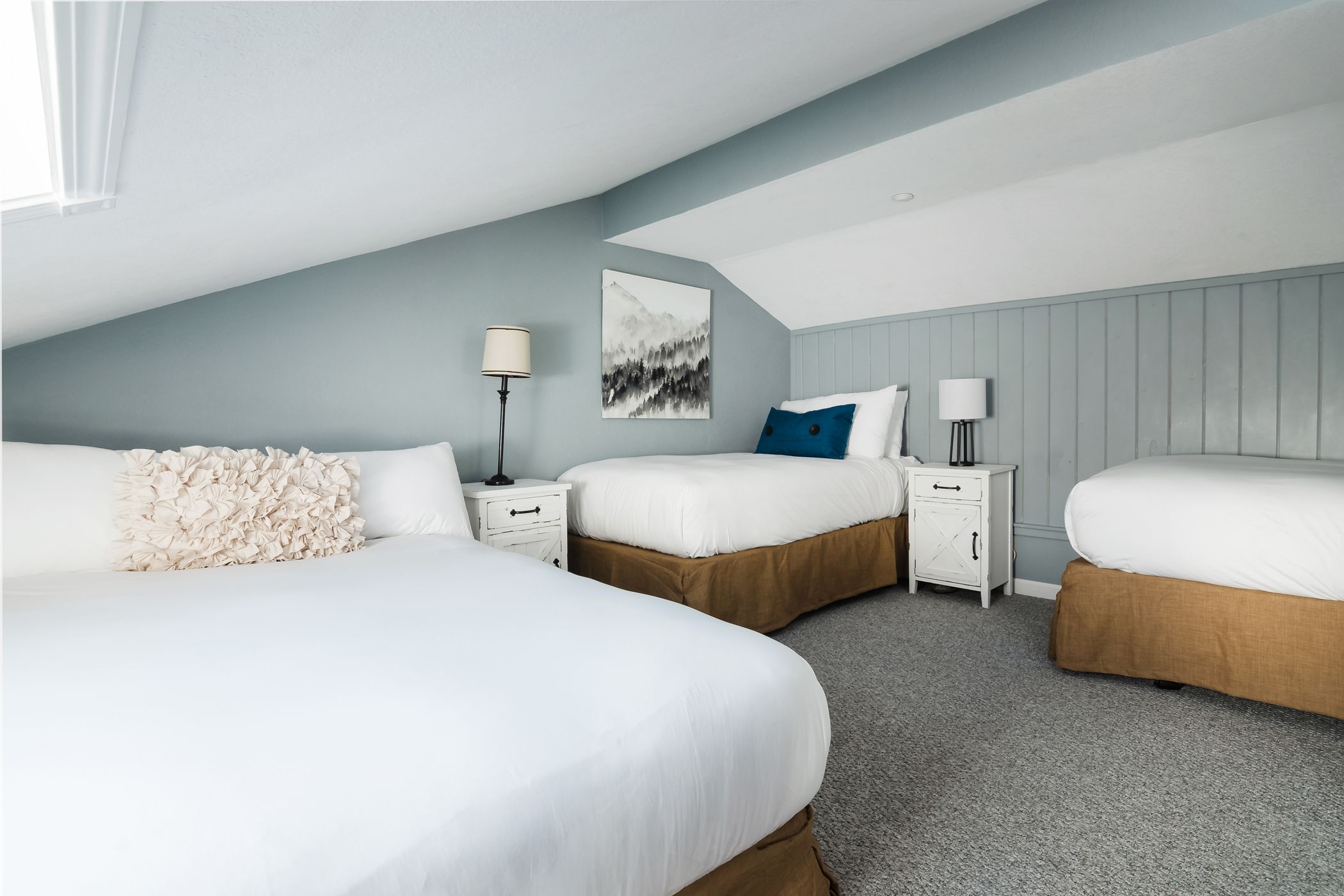 bedroom with three beds in mountain villa