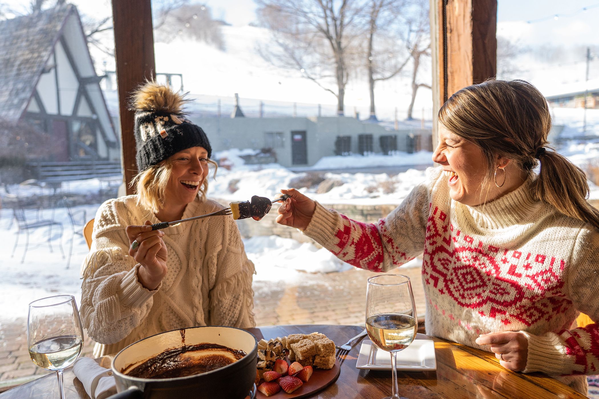 Spread of food on a picnic able outside at boyne mountain