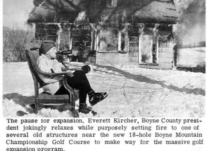 Everett Kircher relaxing in a chair after a controlled burn of a structure taken down for the new golf course.