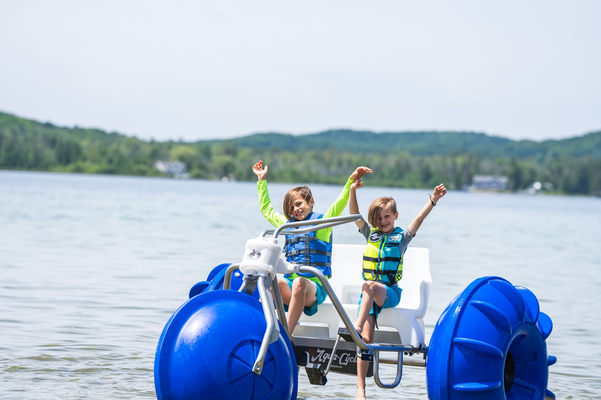 Two boys on a Aqua Cycle