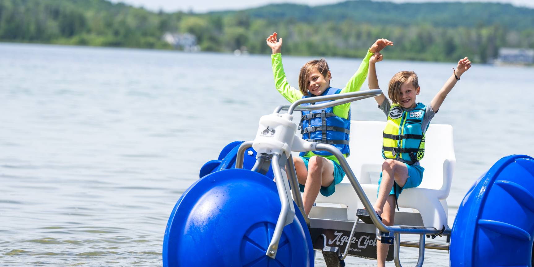 Two boys on a Aqua Cycle