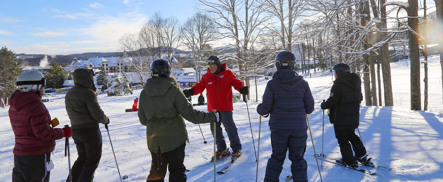 A group of adults taking a lesson