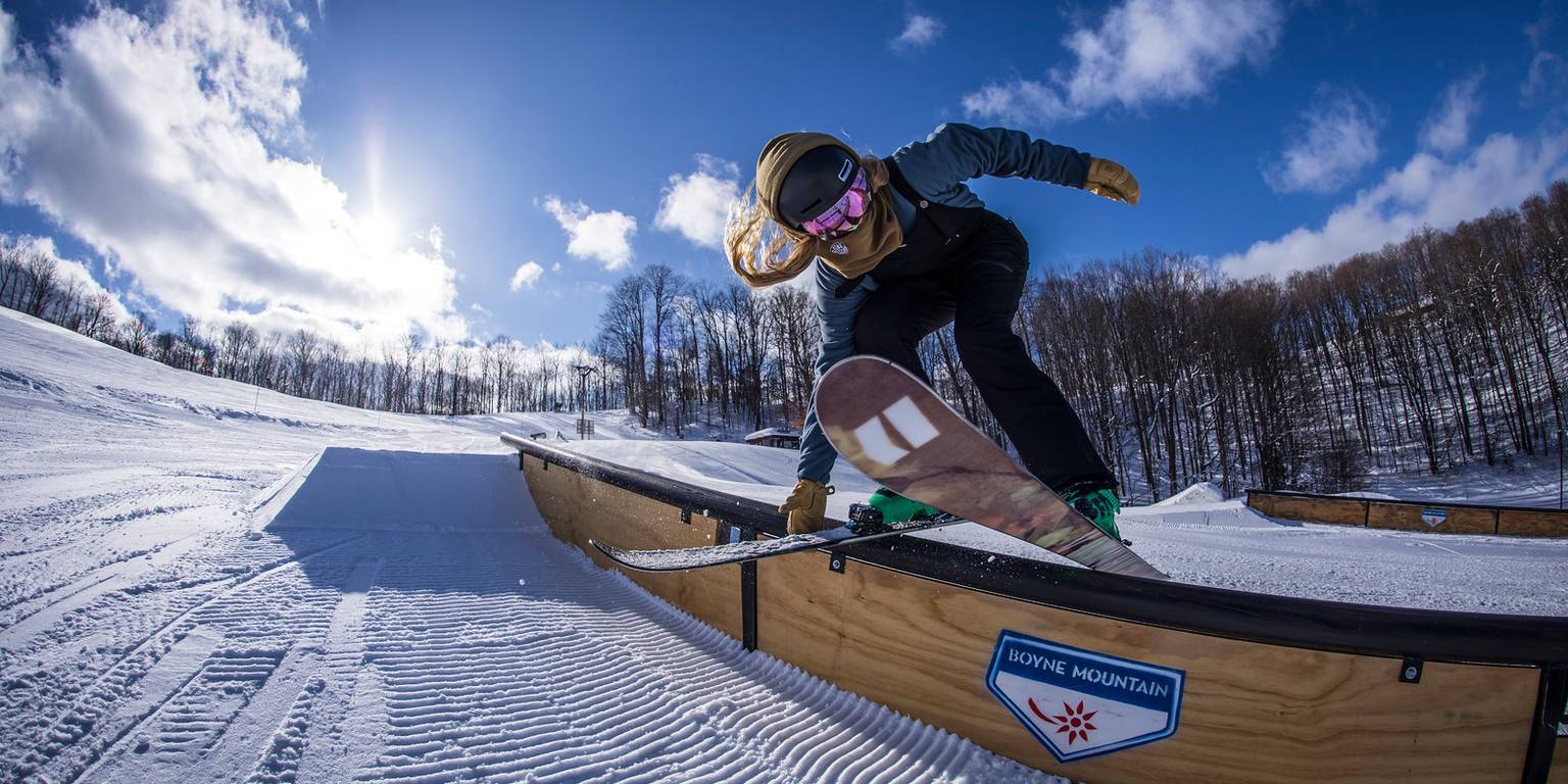 Skier on the rails in the terrain park