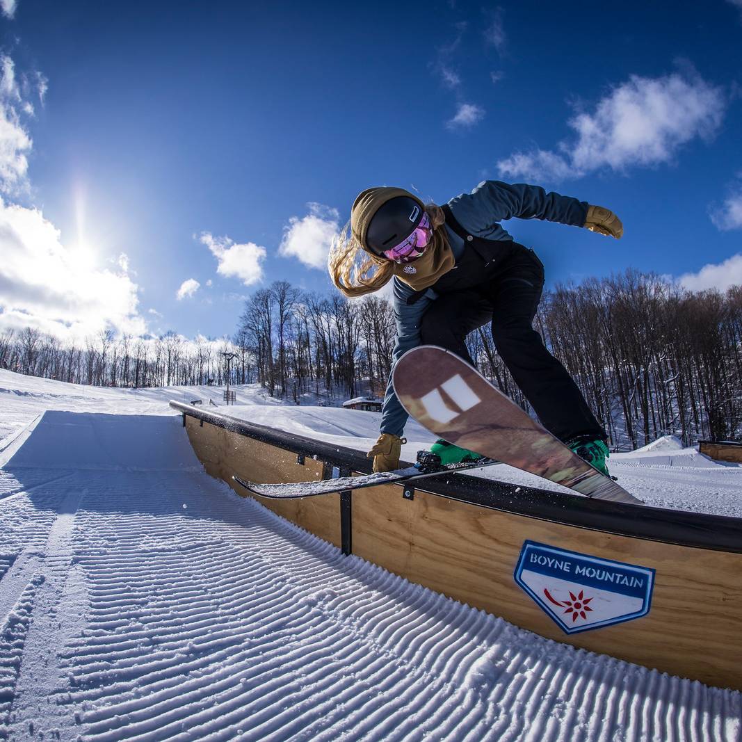 Skier on the rails in the terrain park