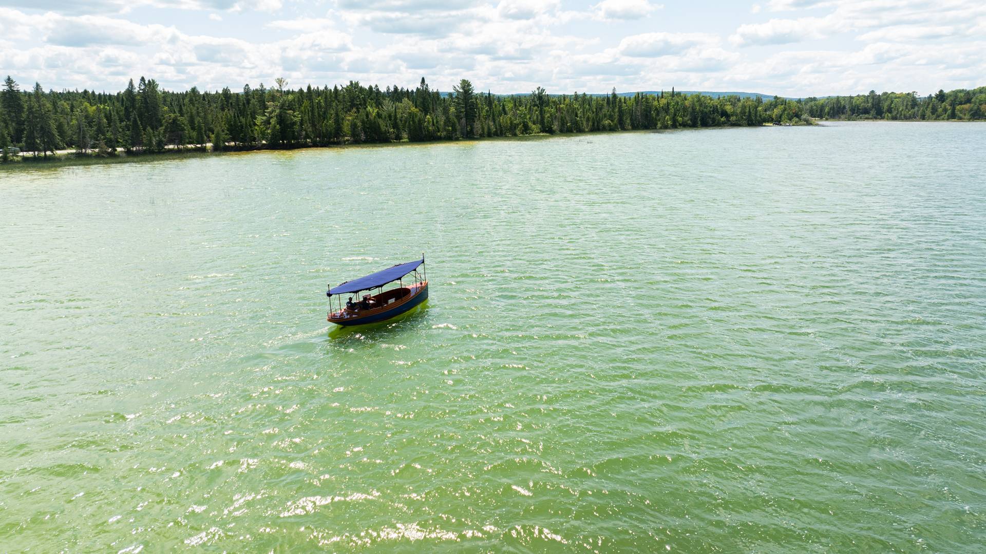 Drone view of Miss Donna cruising deer lake