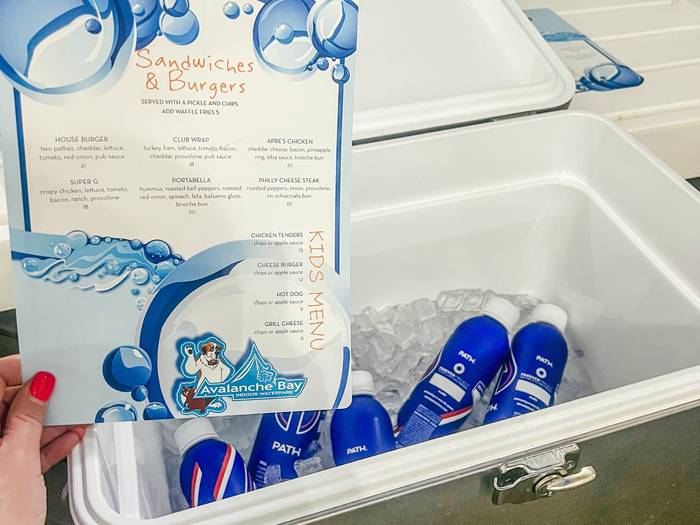 Cooler with Pathwater in Cabana at Avalanche Bay Waterpark