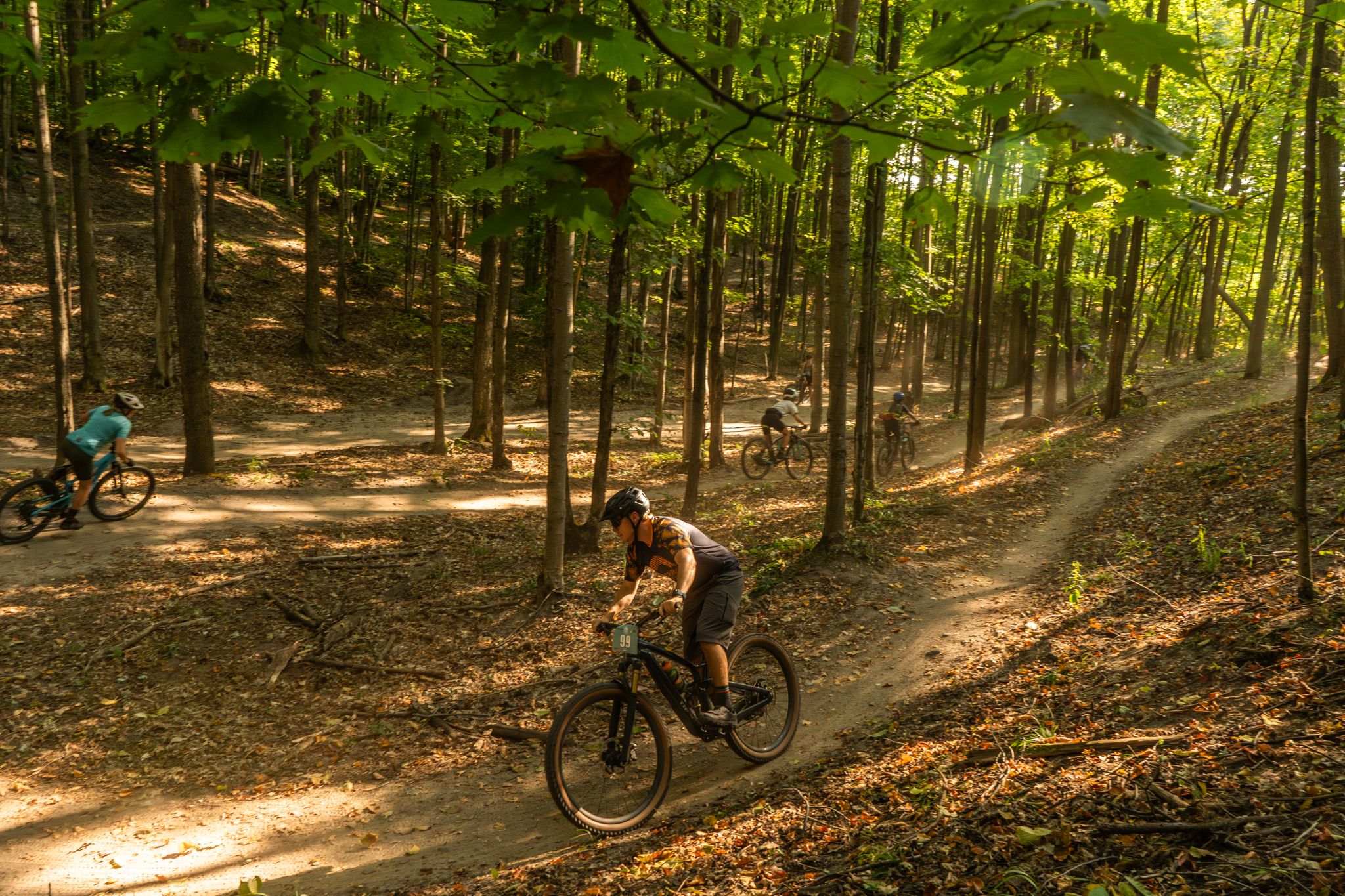 group of mountain bikers at boyne forest trails