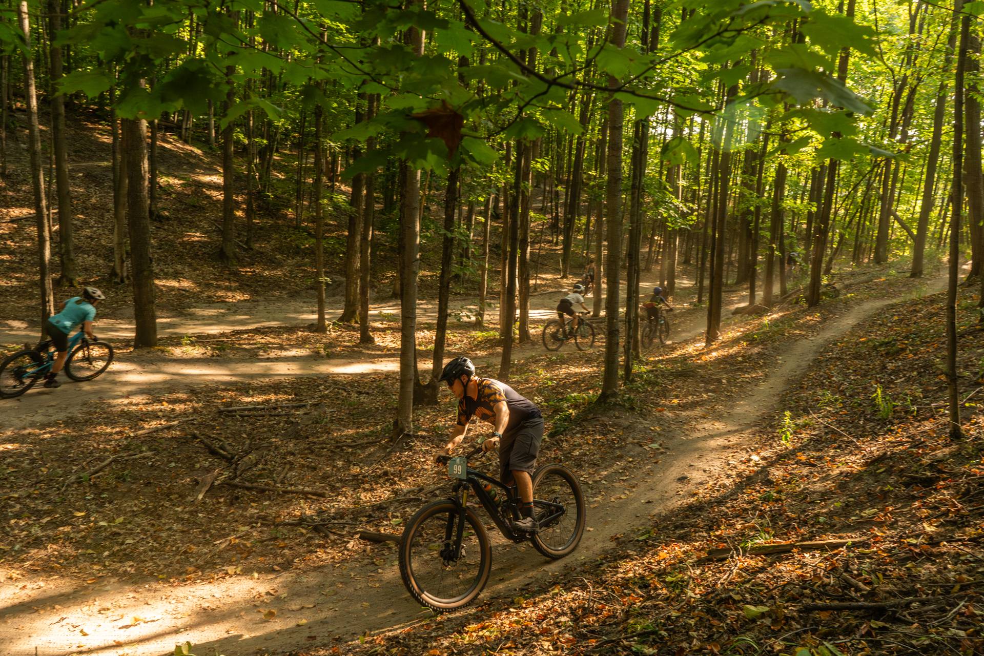 group of mountain bikers at boyne forest trails