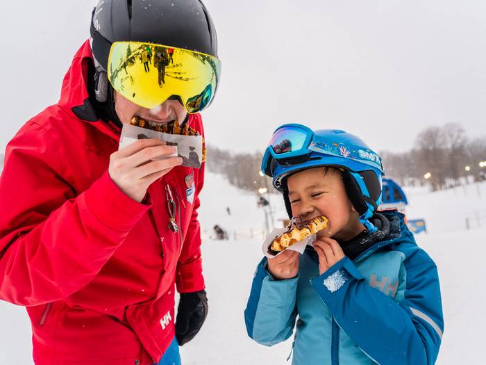 snowsports eating waffle