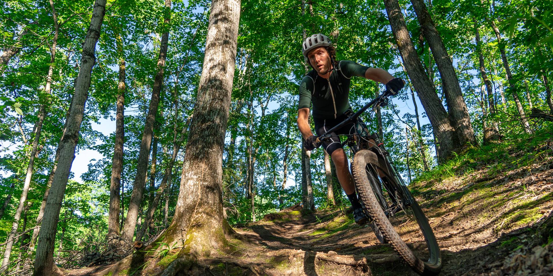 guy biking on the Boyne Mountain trails