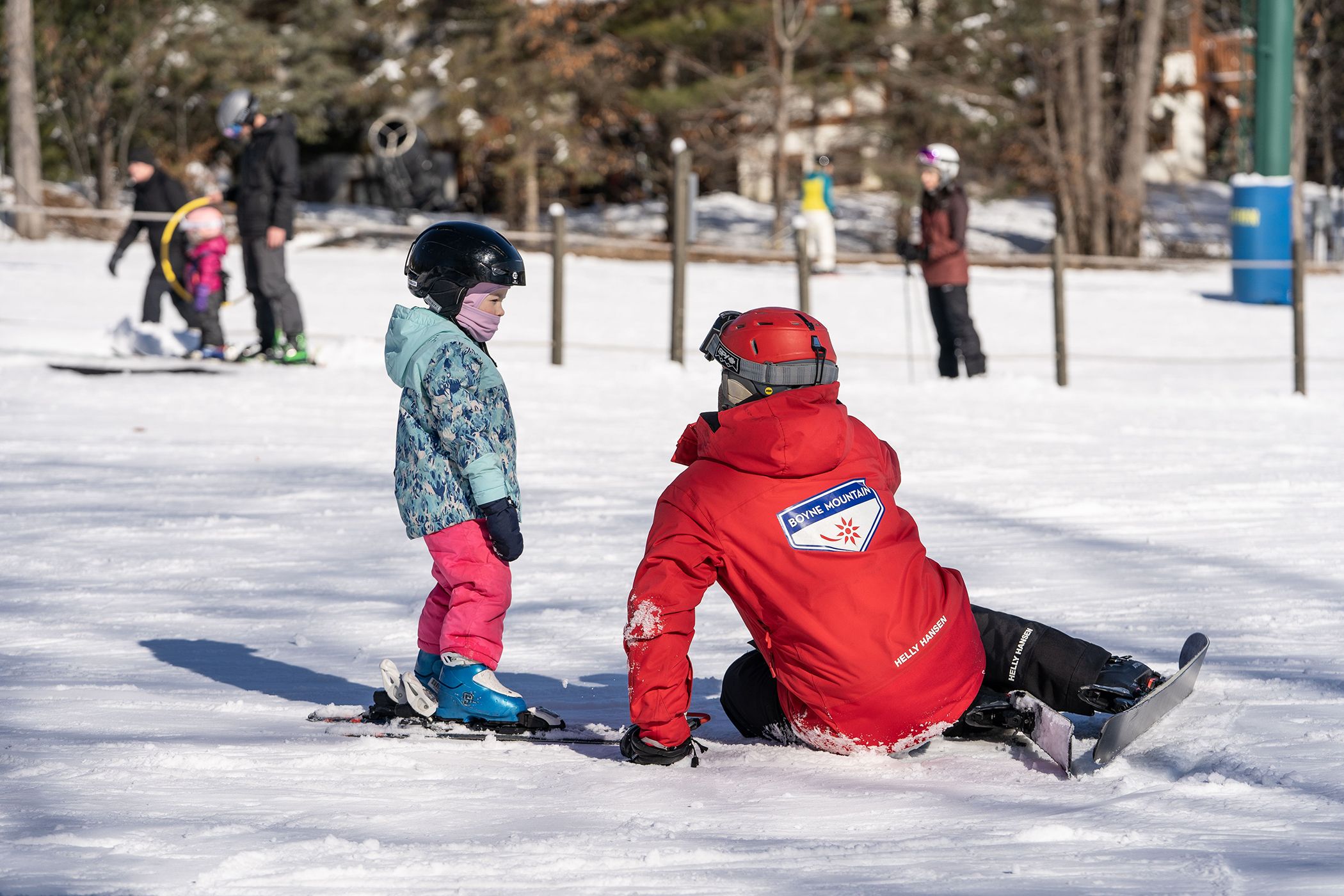 Young child with ski instructor