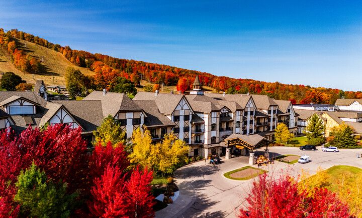 aerial view of boyne mountain with peak fall colors