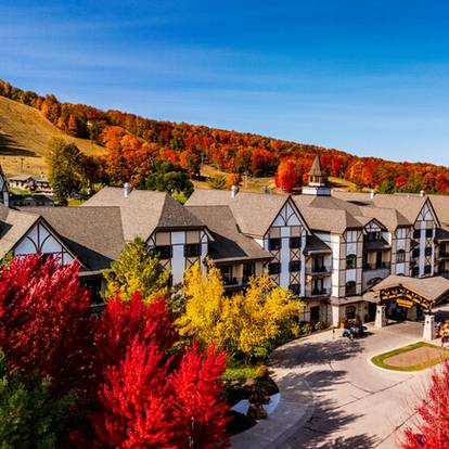 aerial view of boyne mountain with peak fall colors