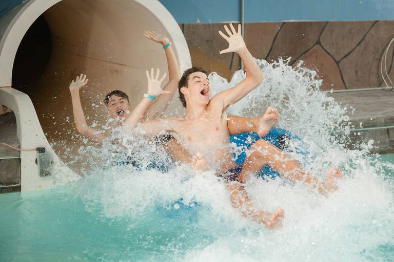 kids coming down waterslide