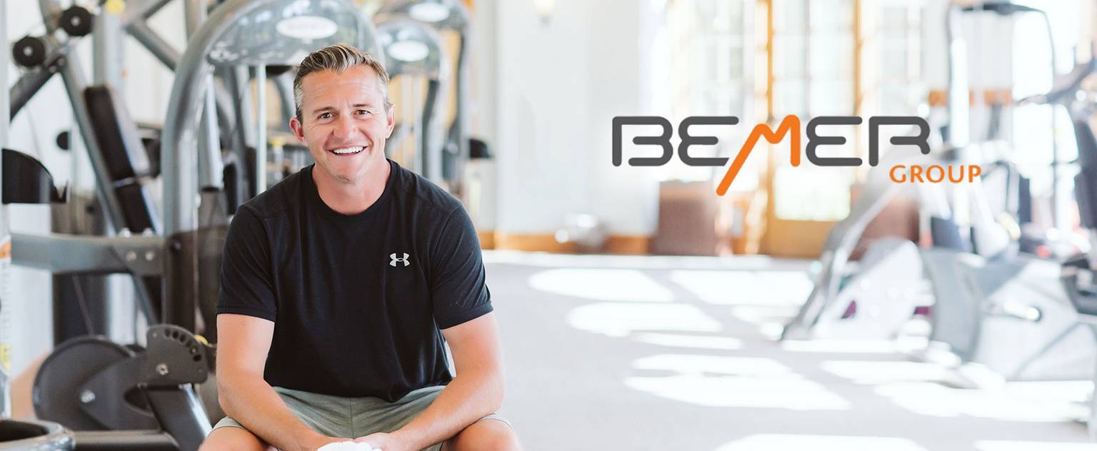 Guy sitting in gym ready to work out