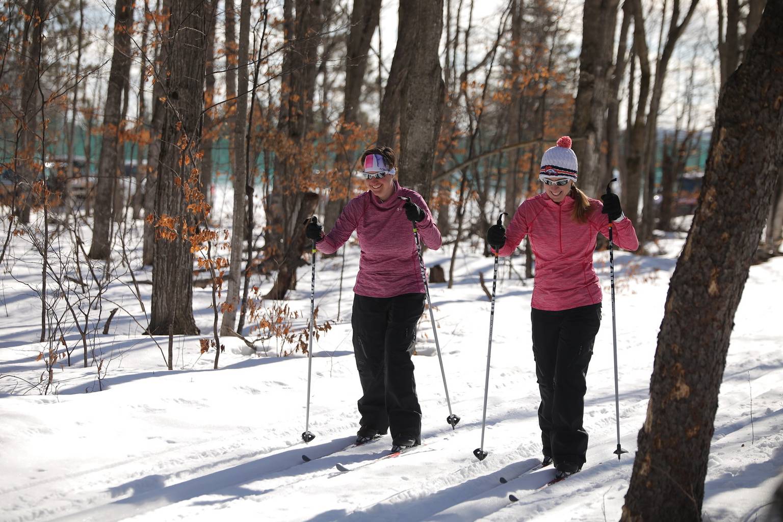 Two ladies cross country skiing