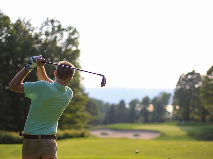 man golfing at Boyne Mountain