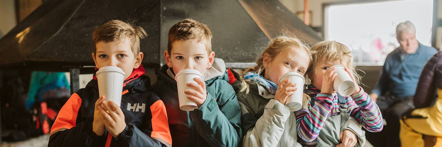 Children drinking Hot Chocolate in the Eagles Nest