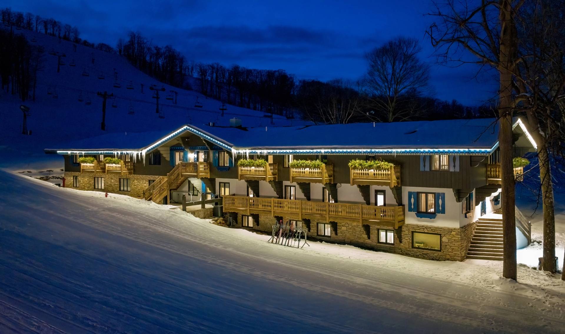 exterior of chalet edelweiss winter night