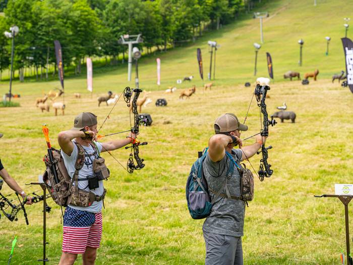 Participants taking aim at targets