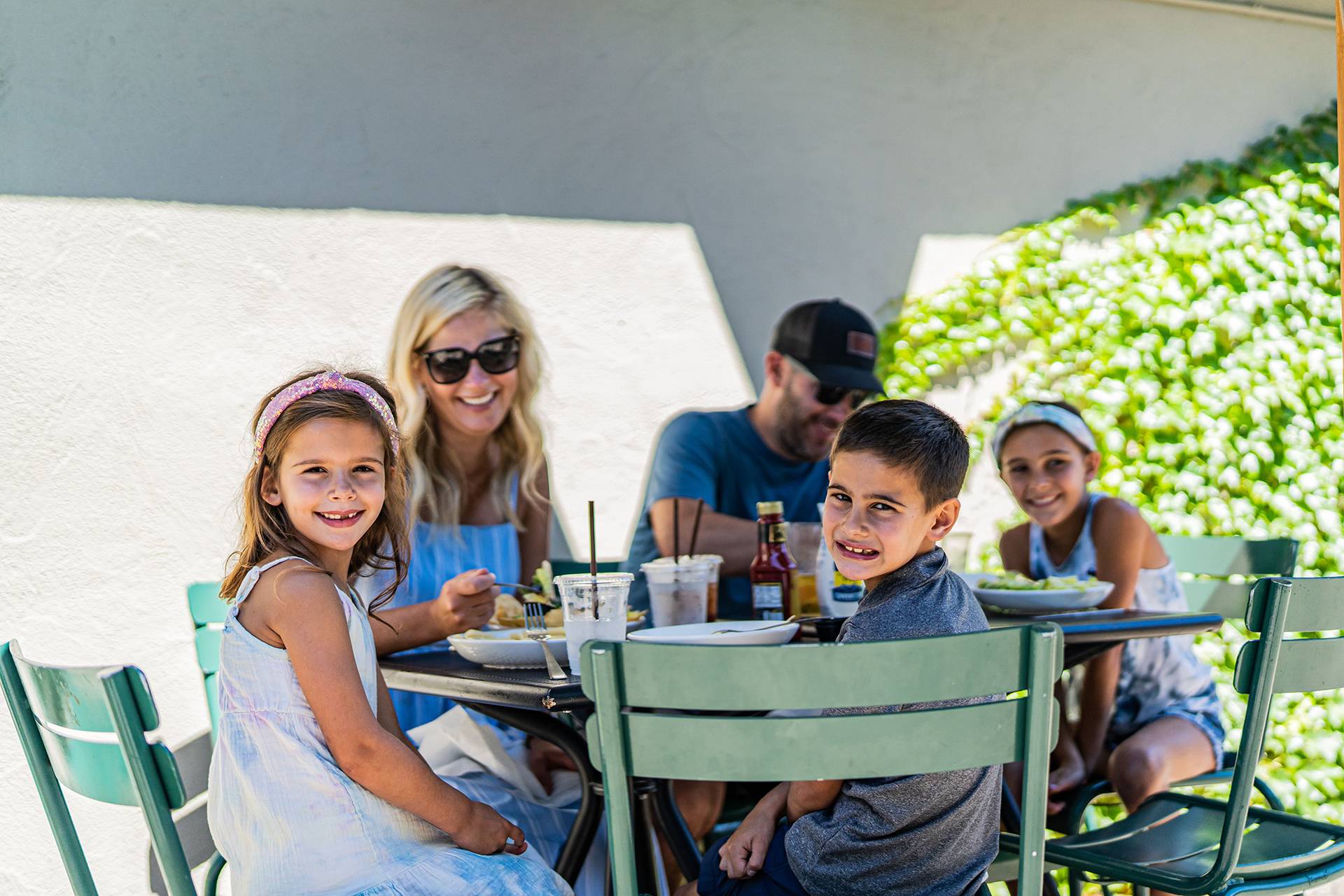 Girls eating and drinking in an igloo