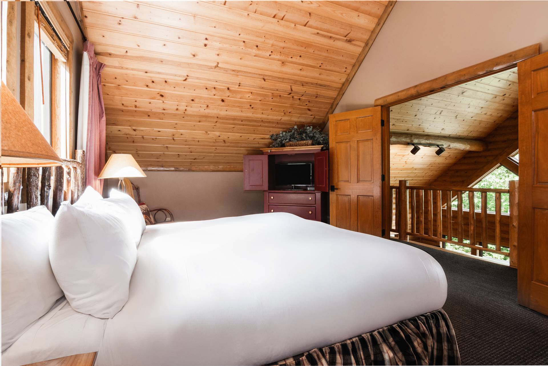 loft bedroom inside mountain cabin