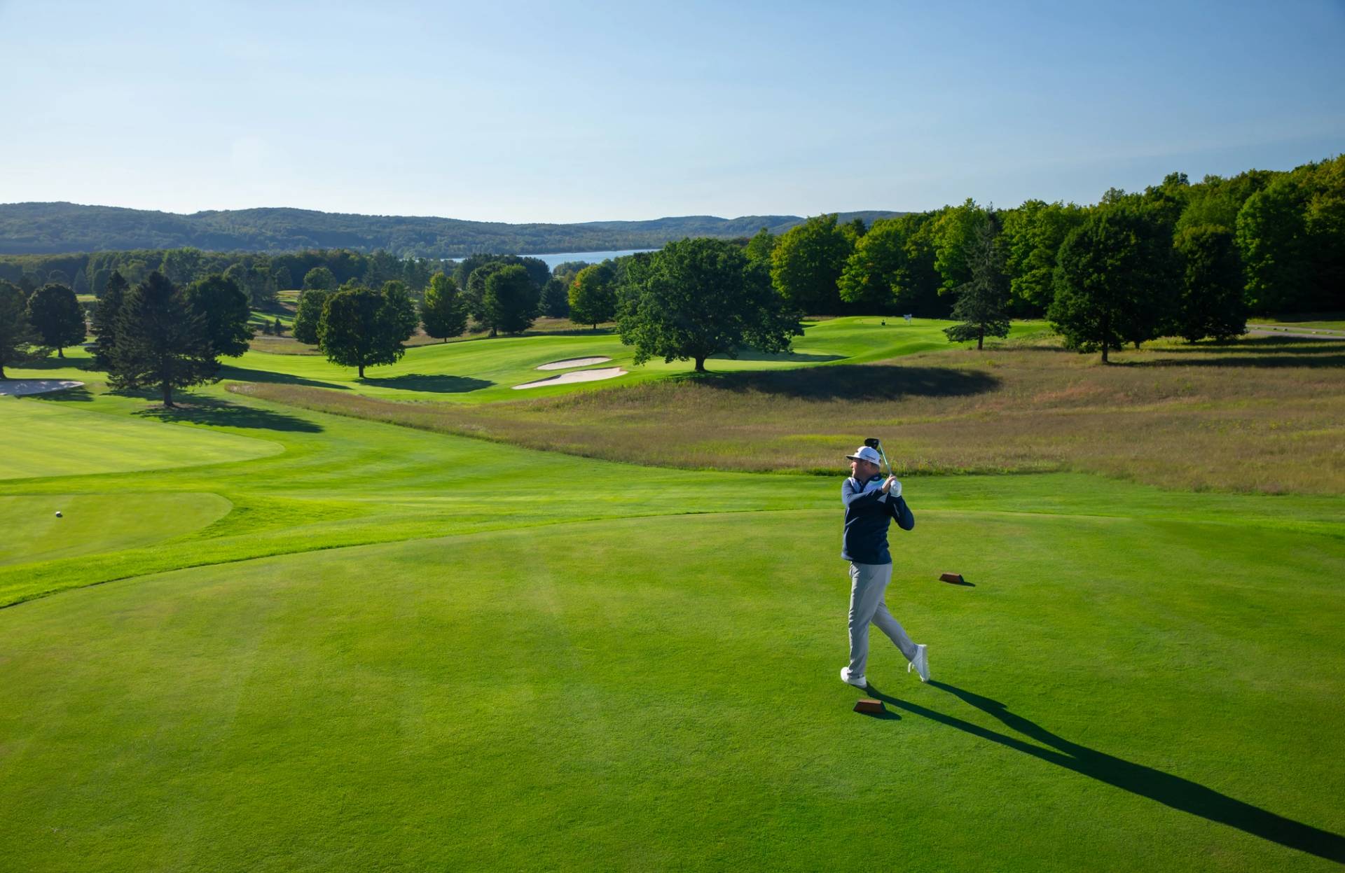 golfer taking swing