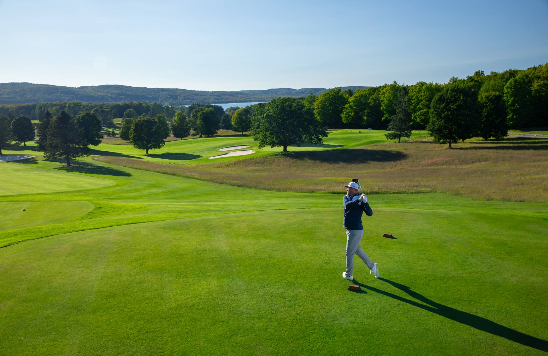 golfer taking swing