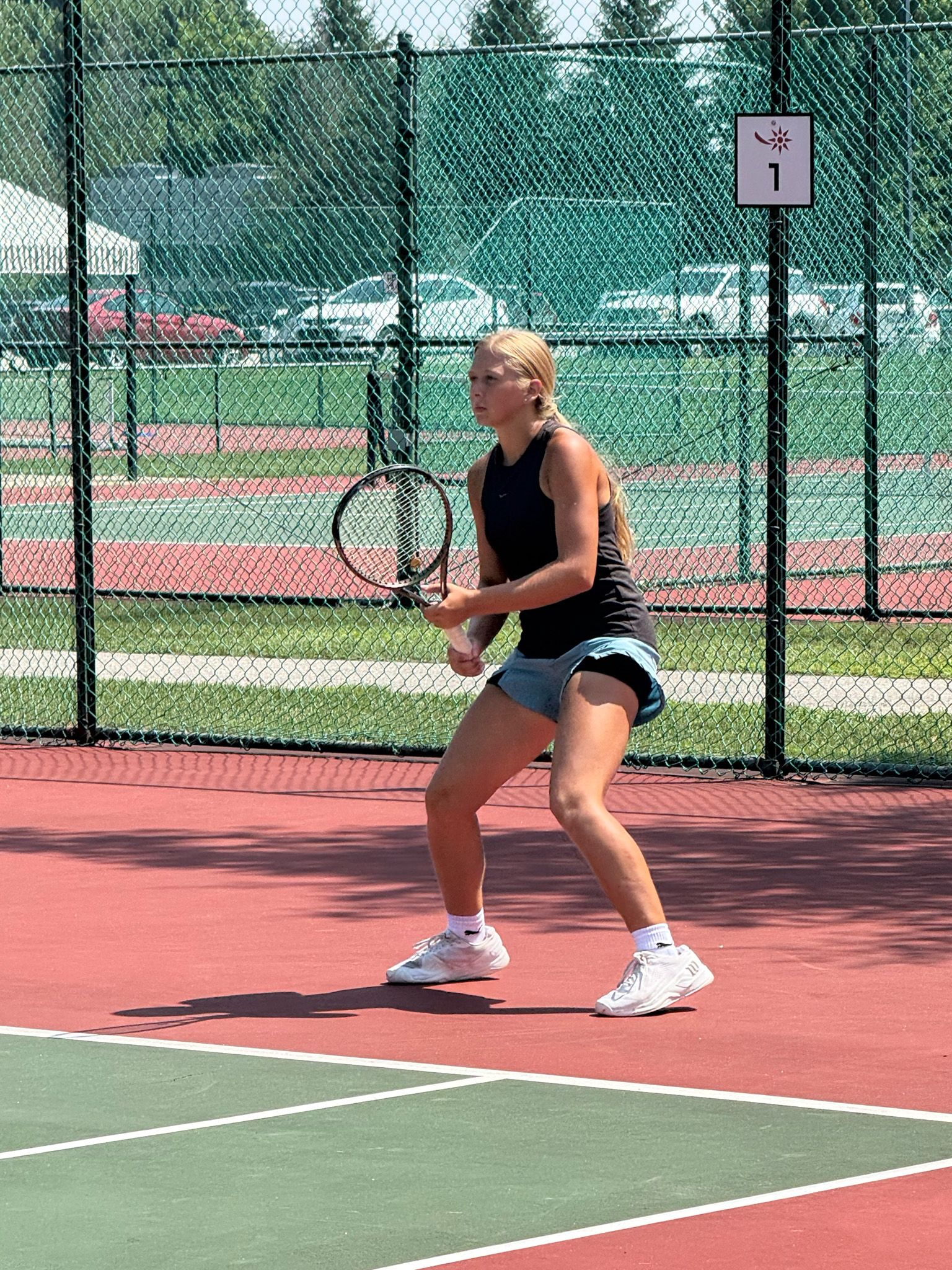 Girl getting ready to receive a serve