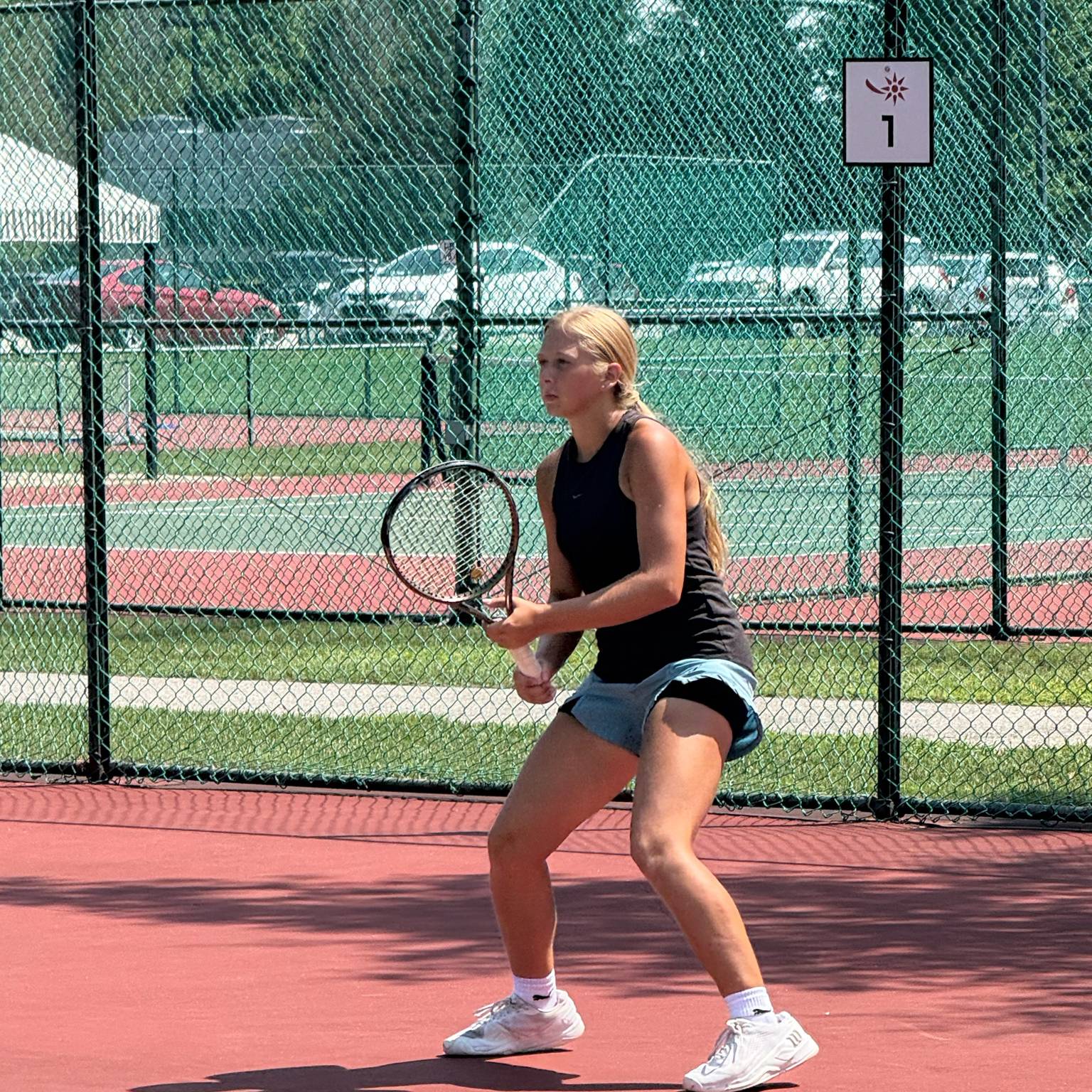 Girl getting ready to receive a serve