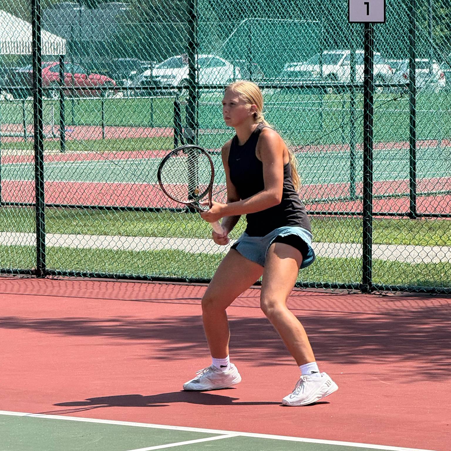Girl getting ready to receive a serve
