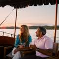 couple on Miss Donna at sunset
