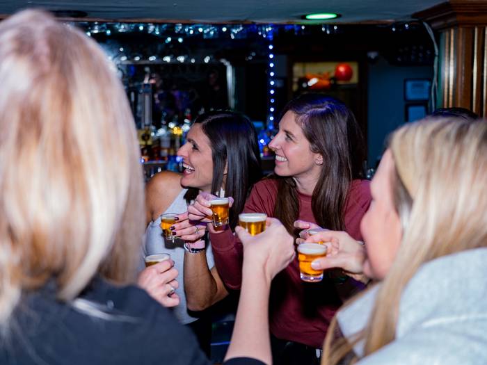 Ladies smiling with drinks