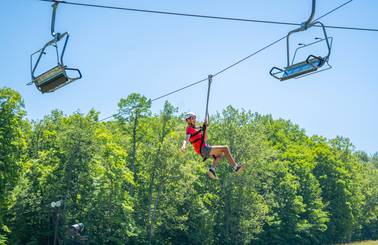zipline under meadows chairlift