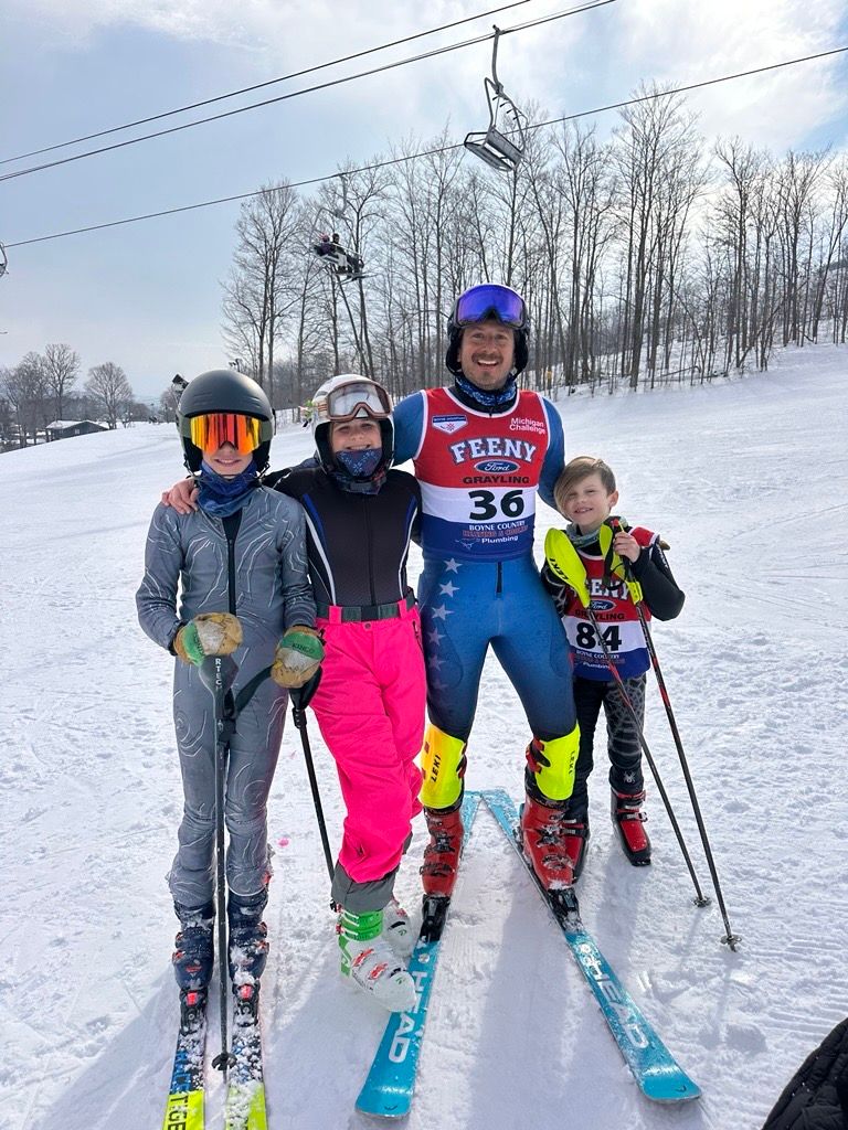 Dad and children after the ski race