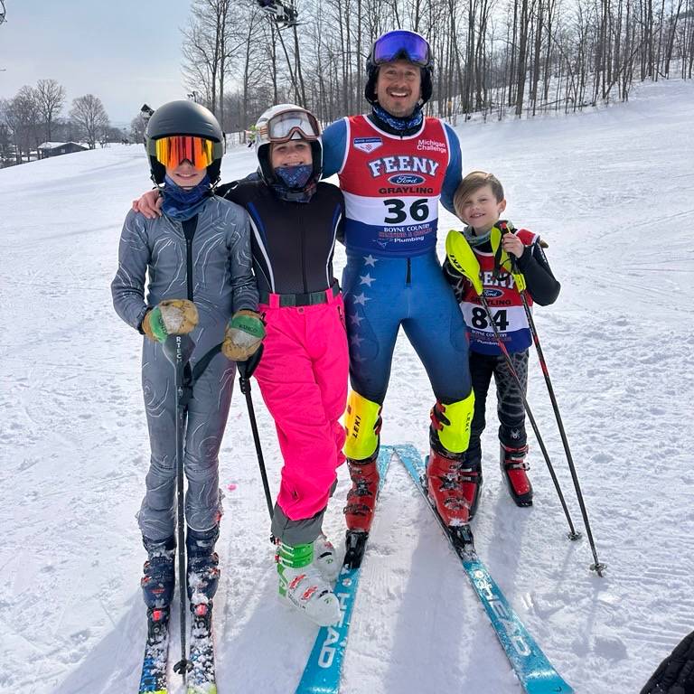 Dad and children after the ski race